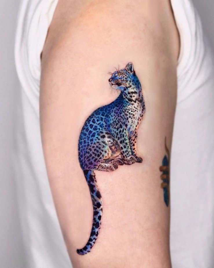 Blue ink leopard tattoo