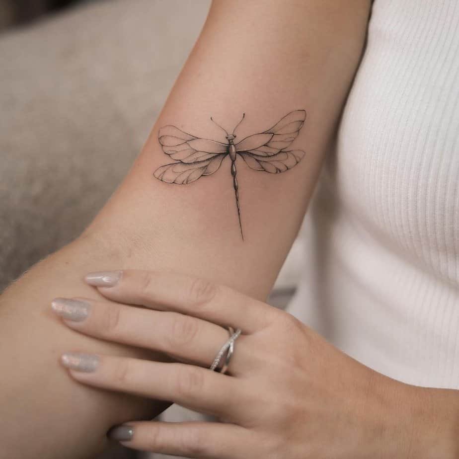 Boho style dragonfly tattoo
