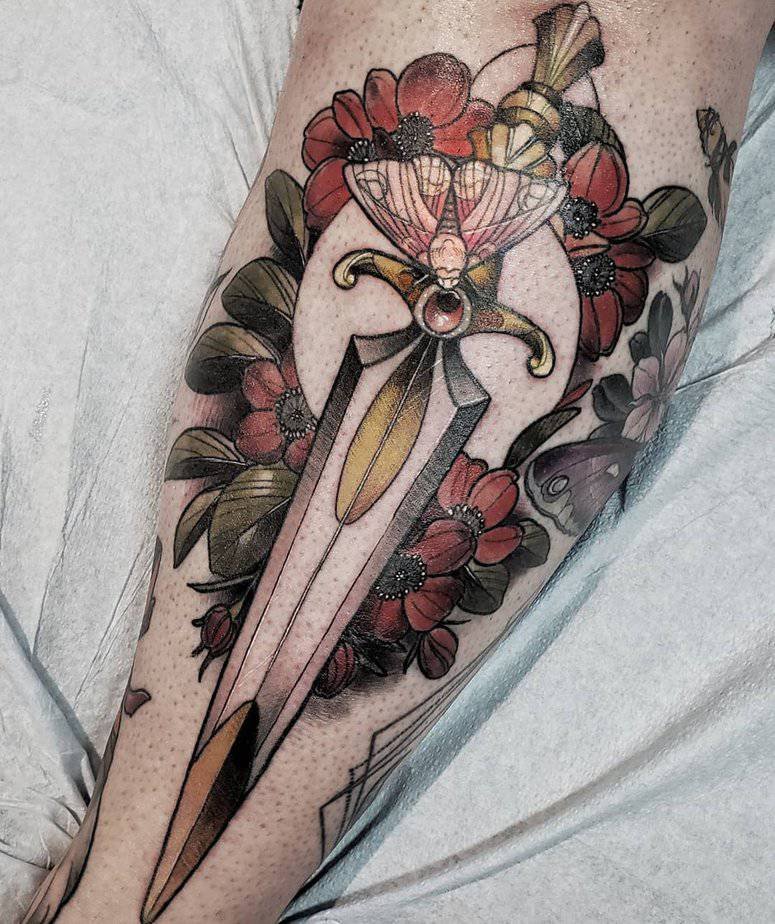 Dagger tattoo with dogwoods