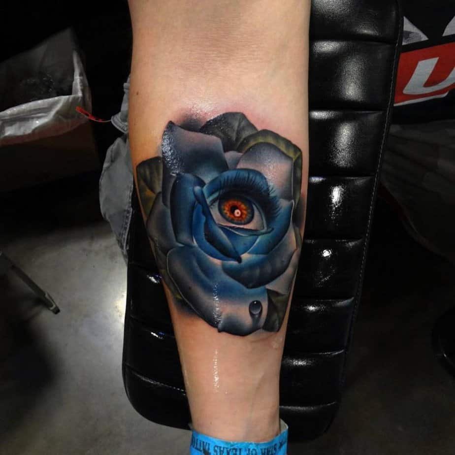 Surreal blue rose with a light brown teary eye inside