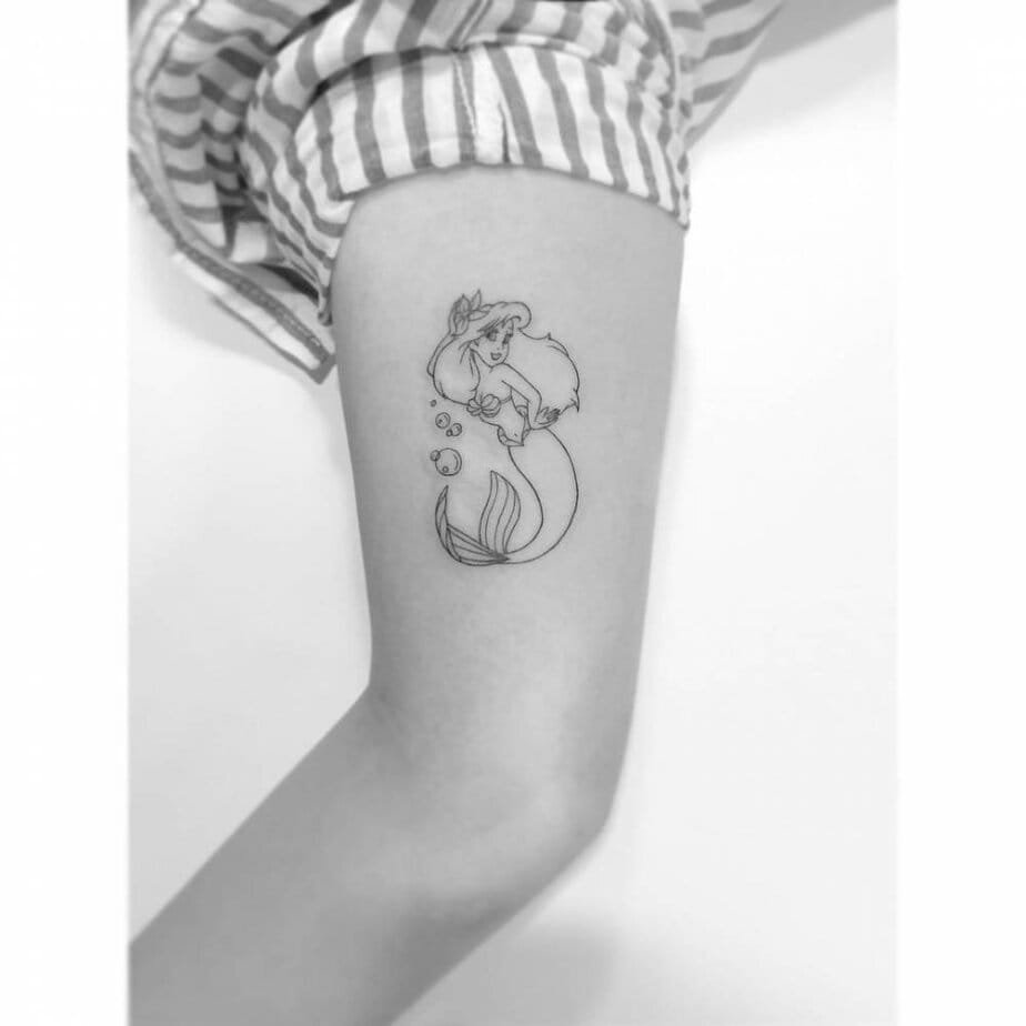 Fine-line Little Mermaid tattoo