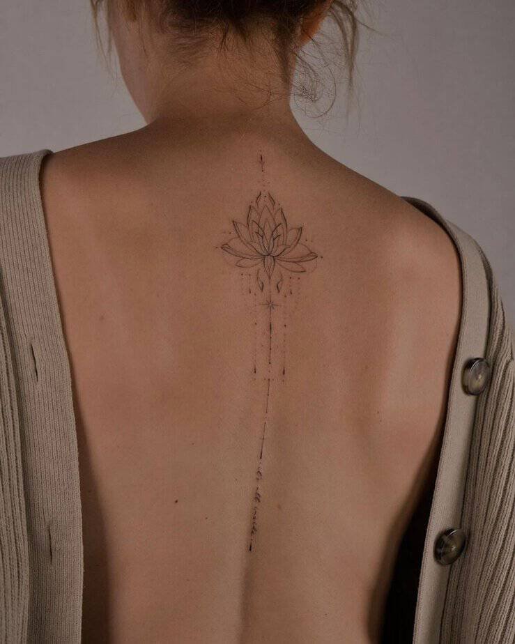 Fine-line back tattoo