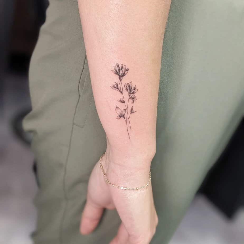 Fine line honeysuckle tattoo