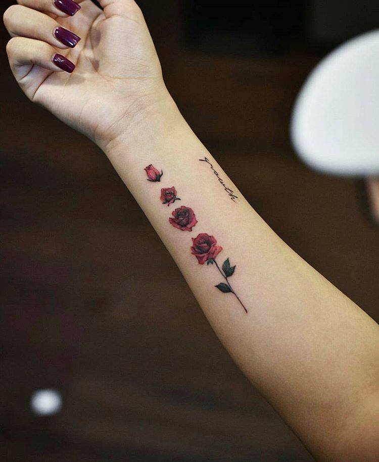 Flower buds tattoo showing stages of growth