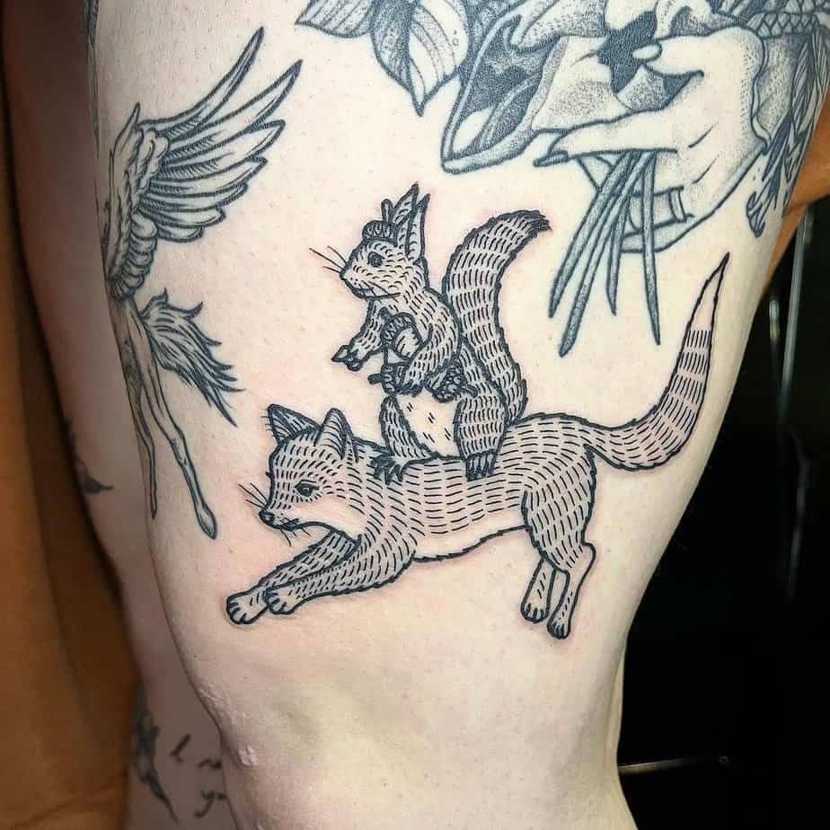 Fox ride squirrel tattoo