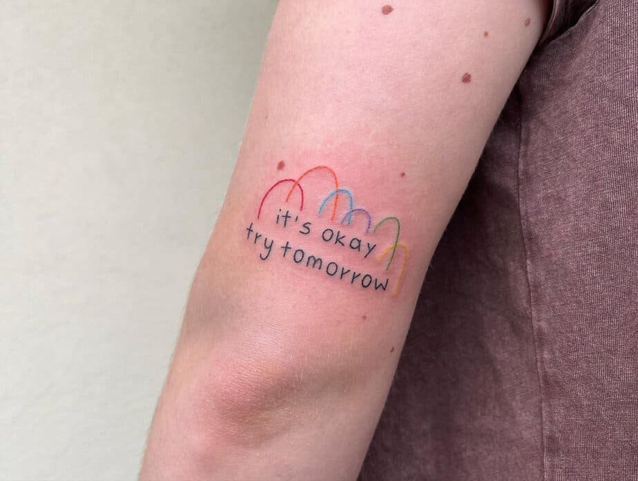 Self-love tattoo — colorful upper arm