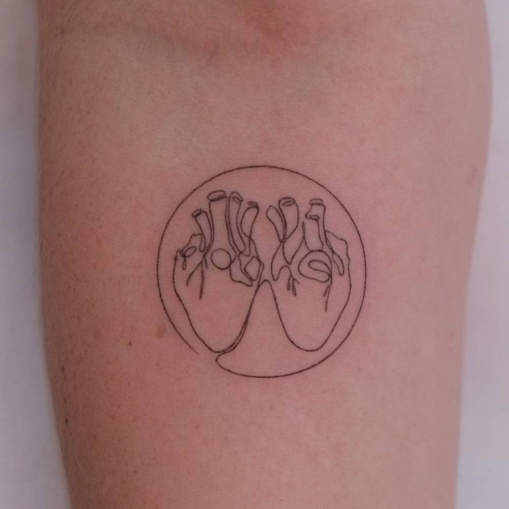 18 Mesmerizing Circle Tattoos You’ll Be Pinning Right Now