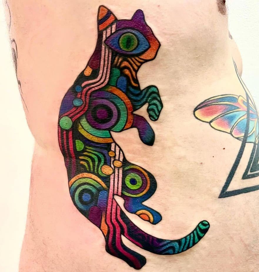 Psychedelic kitty tattoo