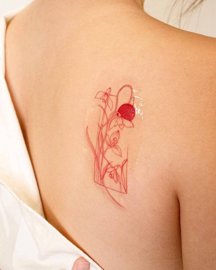 Red ink frame tattoo
