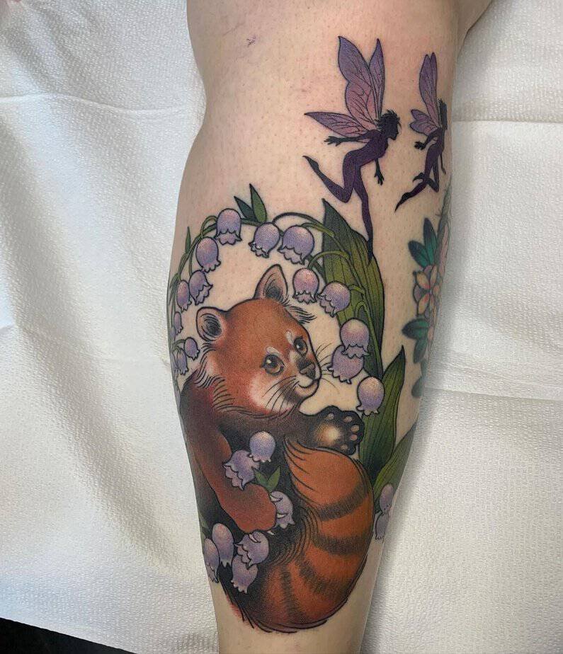Red-panda-among-lilies-of-the-valley.jpg