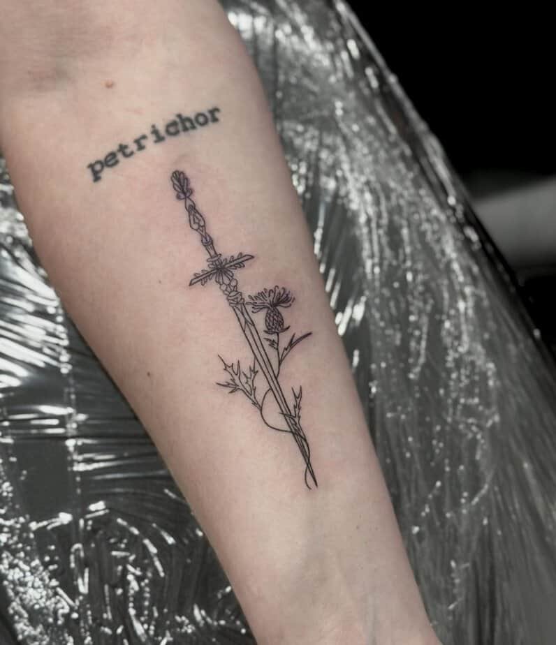 Sword-piece-with-thistle tattoo