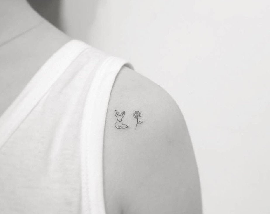 The Little Prince inspired fox and rose shoulder tattoo