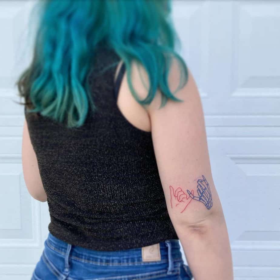 Vibrant pinky promise tattoo