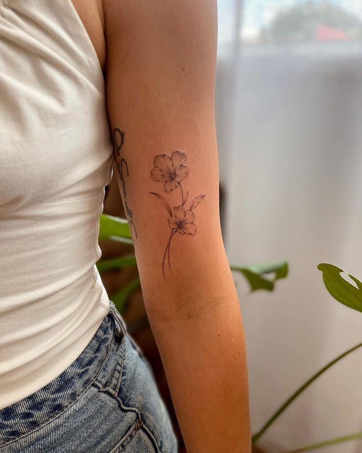 18 Pin‑Worthy February Birth Flower Tattoos You’ll Be Obsessed With
